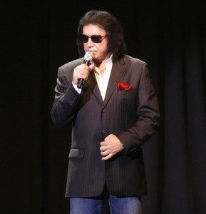 Gene Simmons in shades and a suit, a man who knows how to make music (and money) full time.